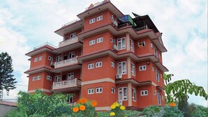 A multi-story building with balconies and windows. - Hotel Bagmati (Kathmandu)