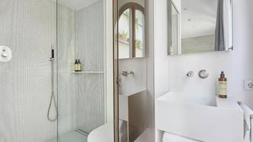 Shower, free toiletries, hair dryer, slippers