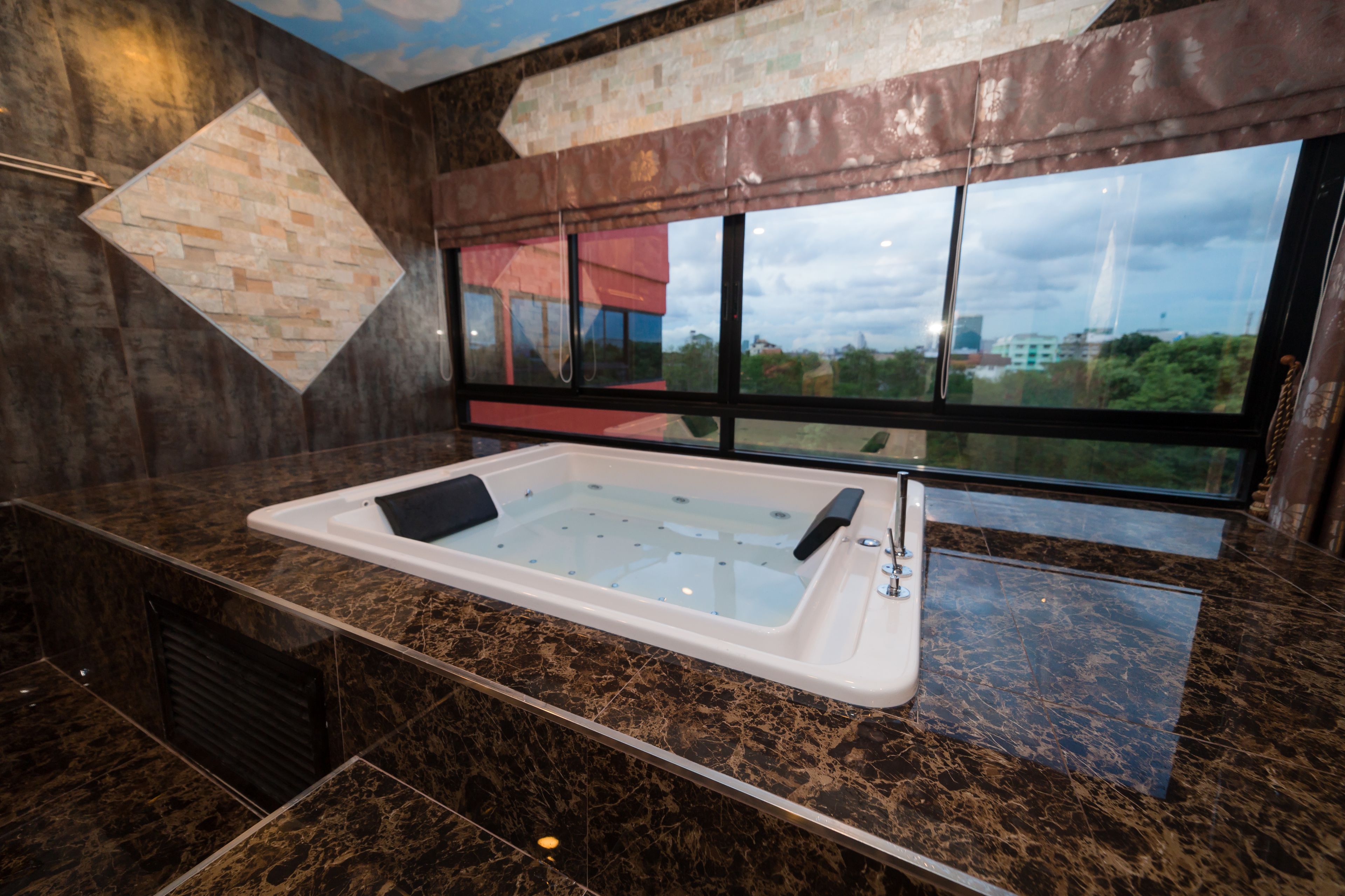 honeymoon studio suite | bathroom | free toiletries, hair dryer, bathrobes, slippers