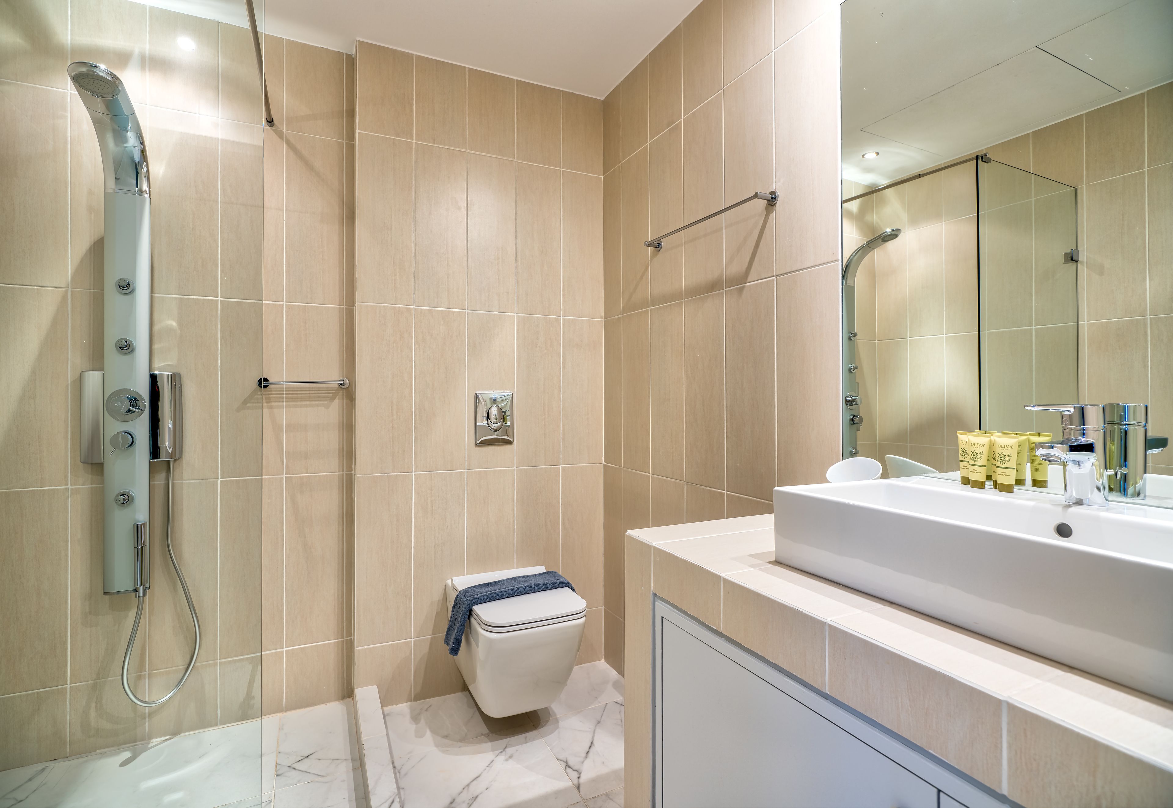junior suite (panoramic acropolis view) | bathroom | shower, free toiletries, hair dryer, bathrobes