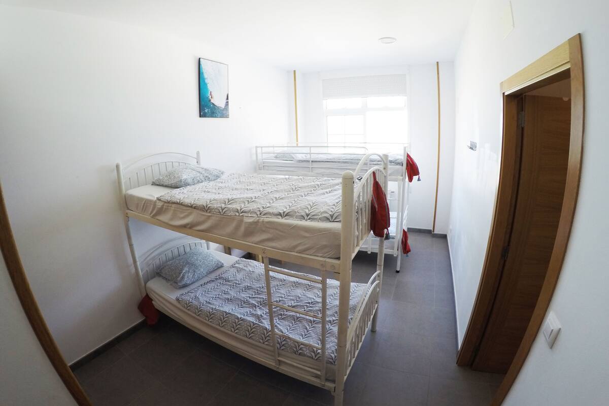 Bed in shared dormitory, private bathroom (4 pax)