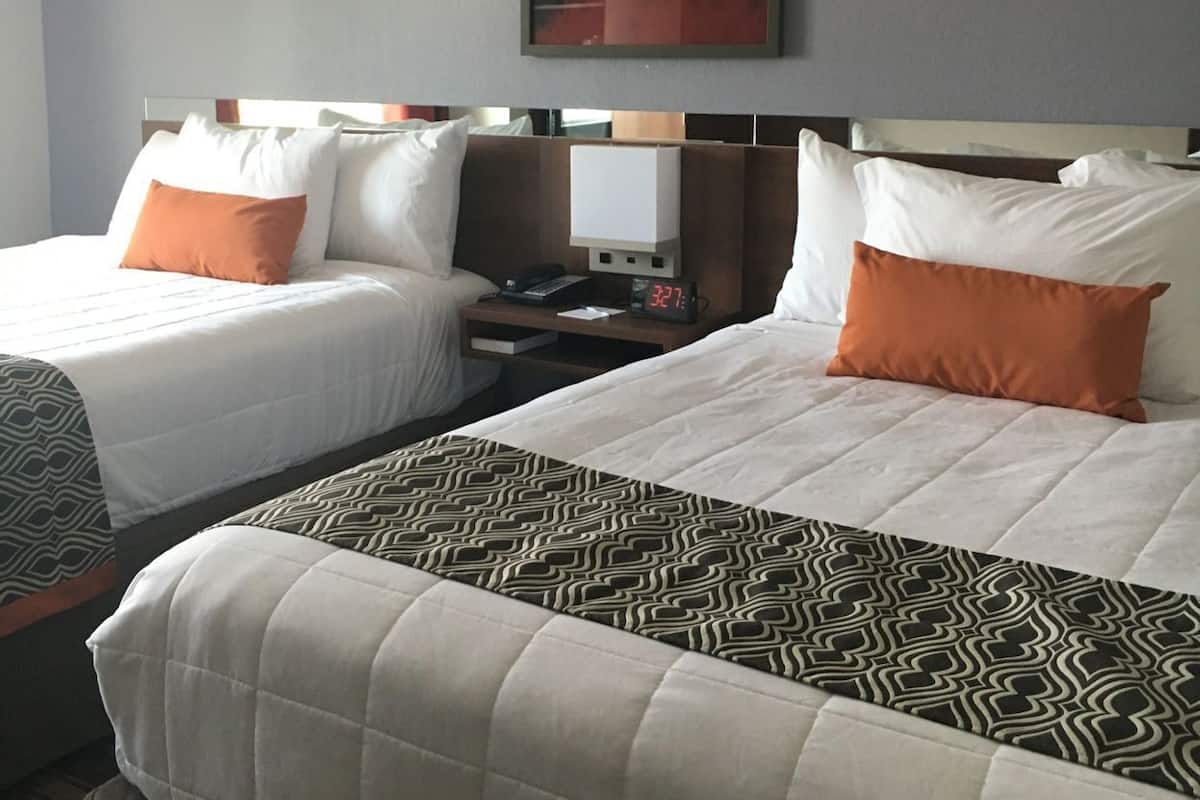 Desk, blackout drapes, soundproofing, free cribs/infant beds