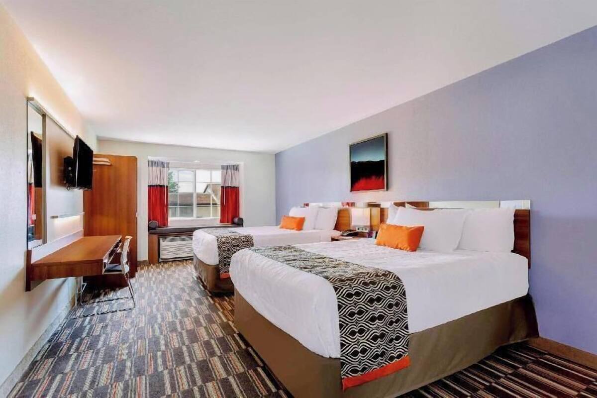 Desk, blackout drapes, soundproofing, free cribs/infant beds