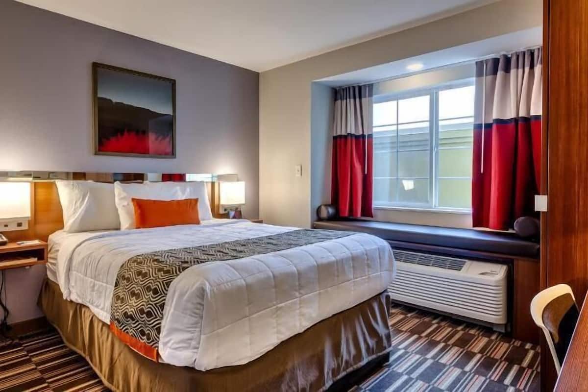 Desk, blackout drapes, soundproofing, free cribs/infant beds