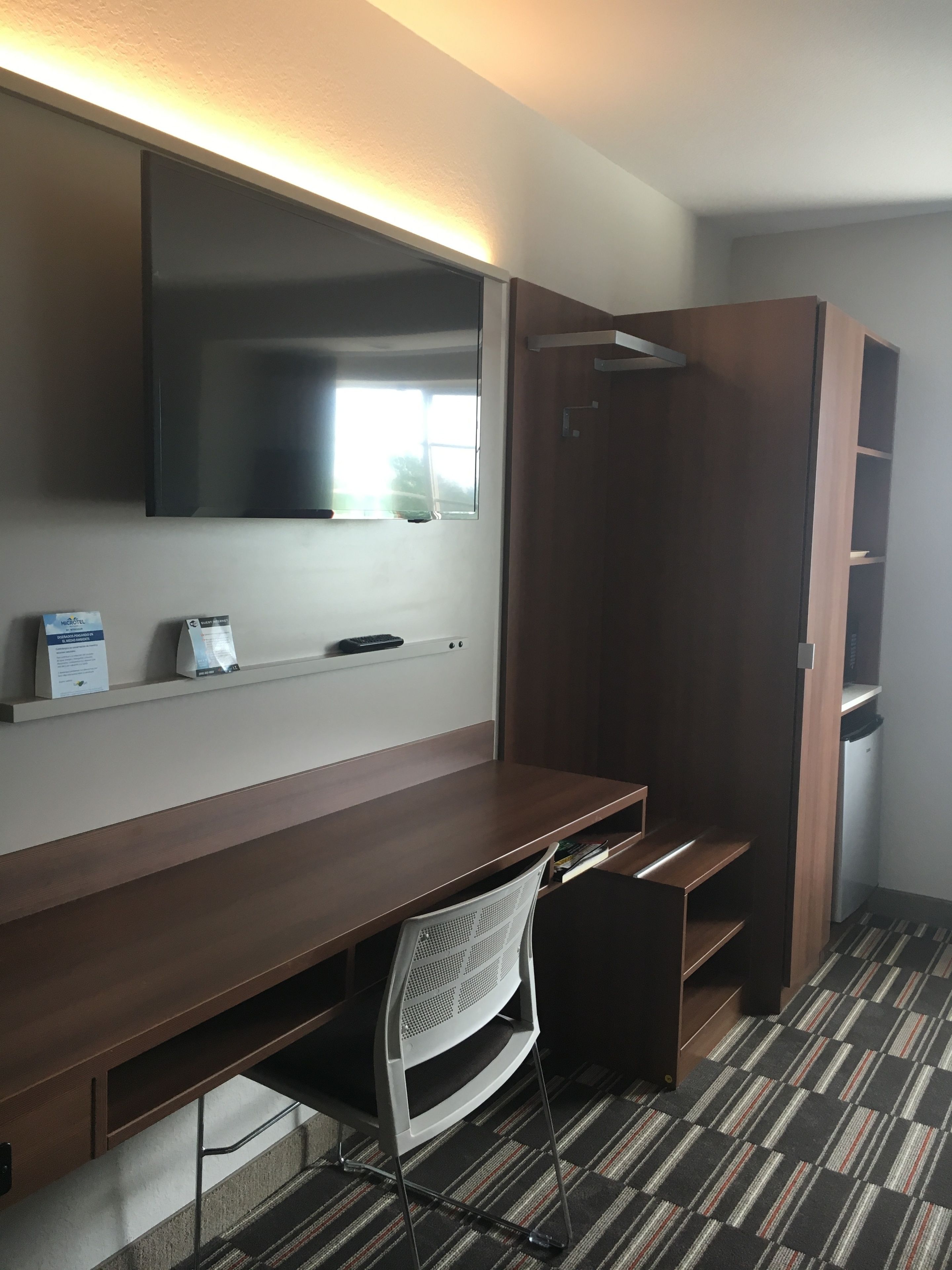 desk, blackout curtains, soundproofing, free cots/infant beds