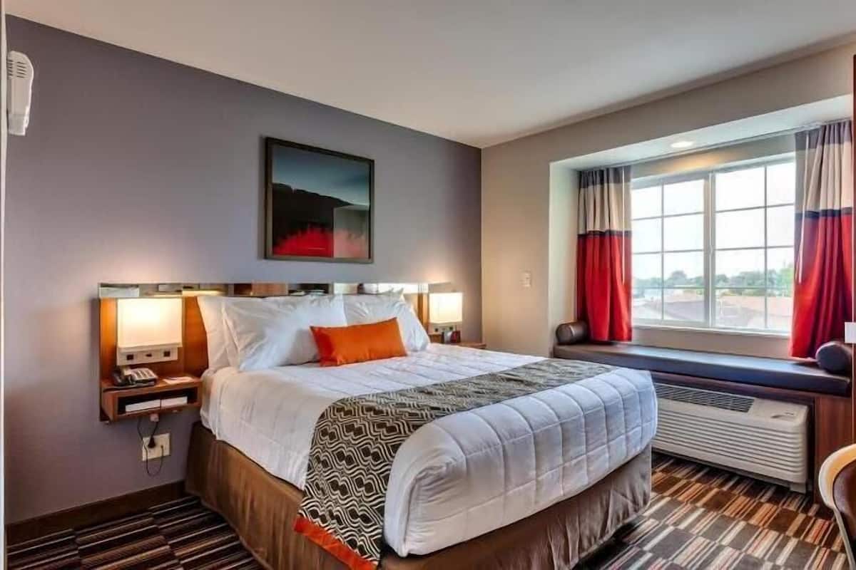 Desk, blackout drapes, soundproofing, free cribs/infant beds