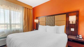 Standard Room, 1 King Bed, Non Smoking, Kitchenette (Larger Room) | Pillowtop beds, in-room safe, desk, blackout drapes