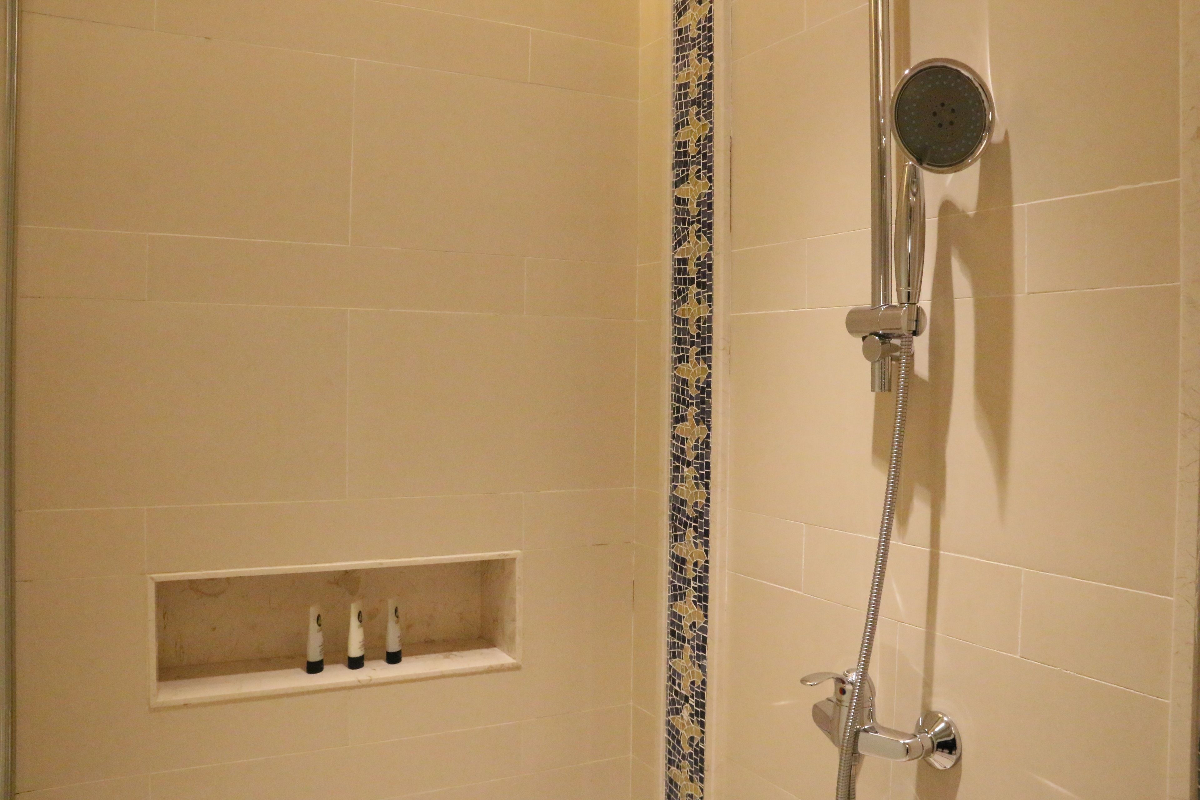 separate bathtub and shower, designer toiletries, hair dryer, bathrobes