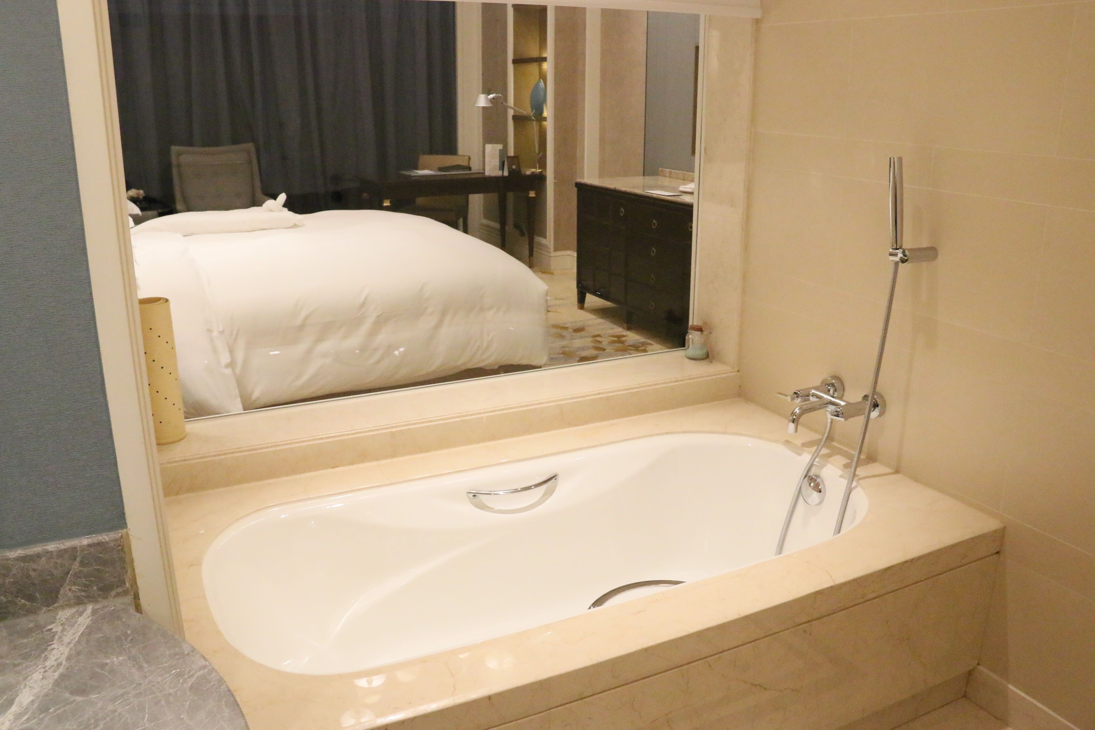 separate bathtub and shower, designer toiletries, hair dryer, bathrobes