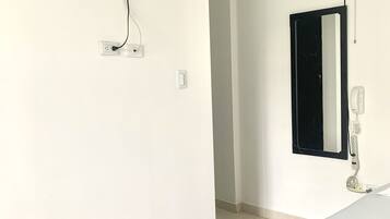 Basic Double Room, Kitchenette | Individually furnished, desk, laptop workspace, iron/ironing board