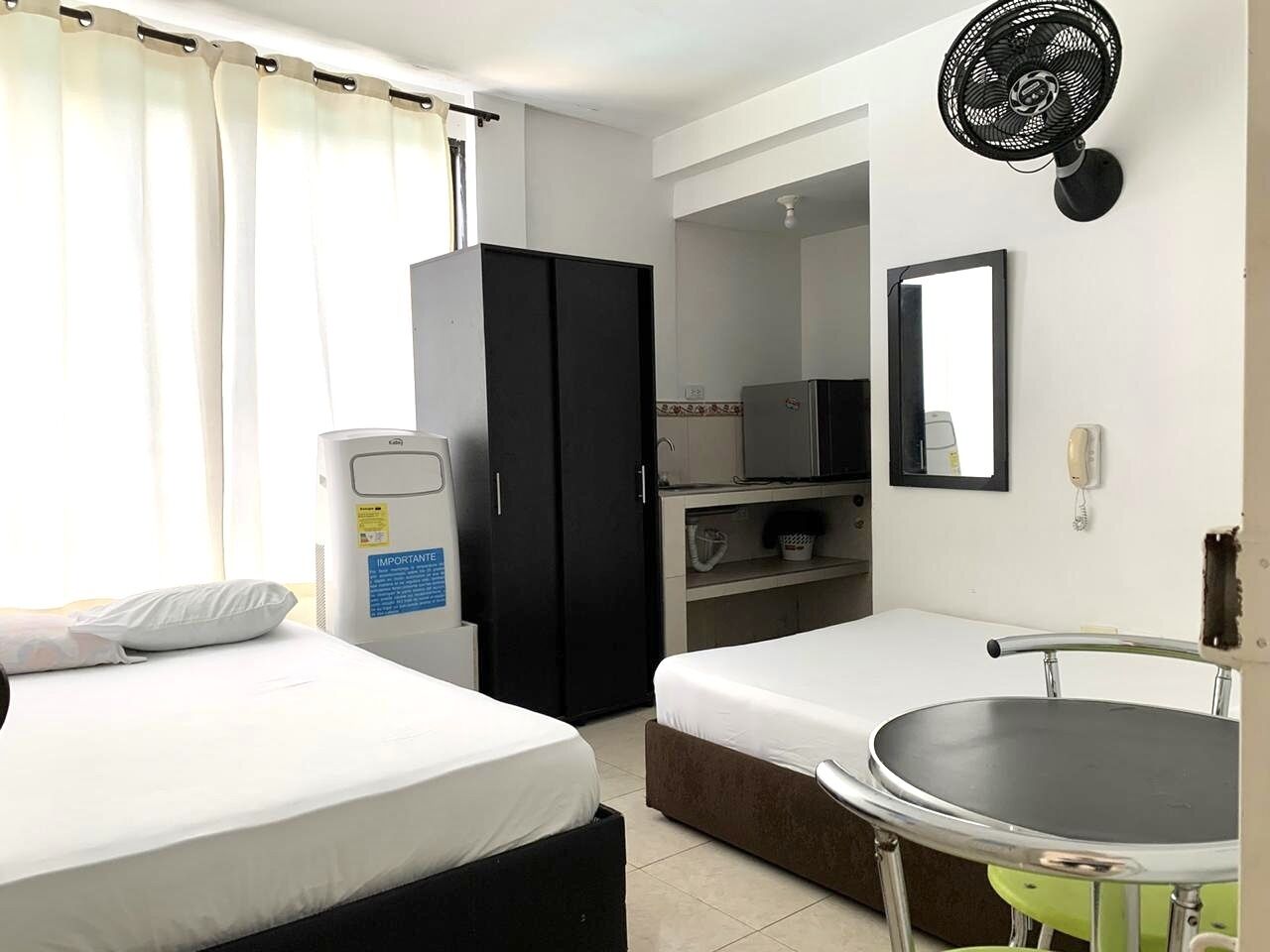 Family Twin Room, Kitchenette | Individually furnished, desk, laptop workspace, iron/ironing board