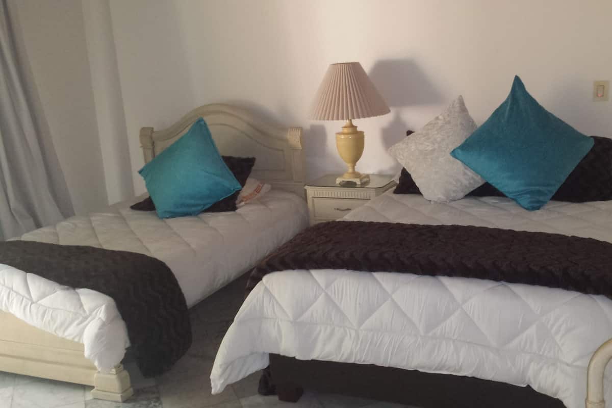 Premium bedding, minibar, iron/ironing board, rollaway beds