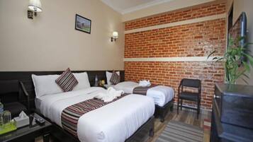 Quarto luxo | Escrivaninha, camas extras/dobráveis, Wi-Fi de cortesia