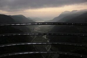 A mountainous landscape with a road running through a valley. - Dhampus Resort (Pokhara)