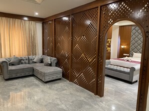 Presidential Suite, 1 King Bed | Living area | Flat-screen TV, fireplace - Hotel Hyderabad Grand (Hyderabad)