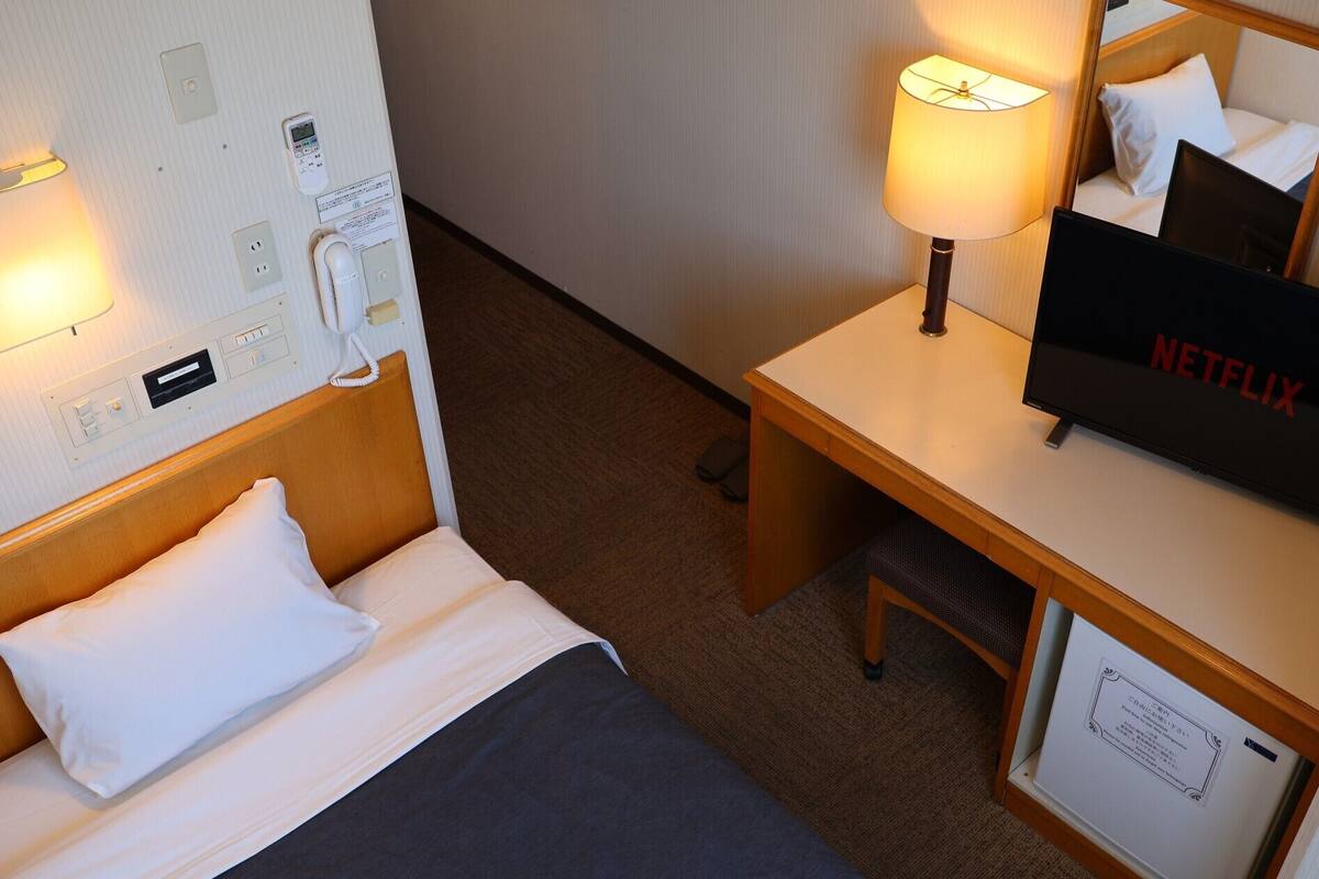 Desk, blackout drapes, WiFi (free), bed sheets