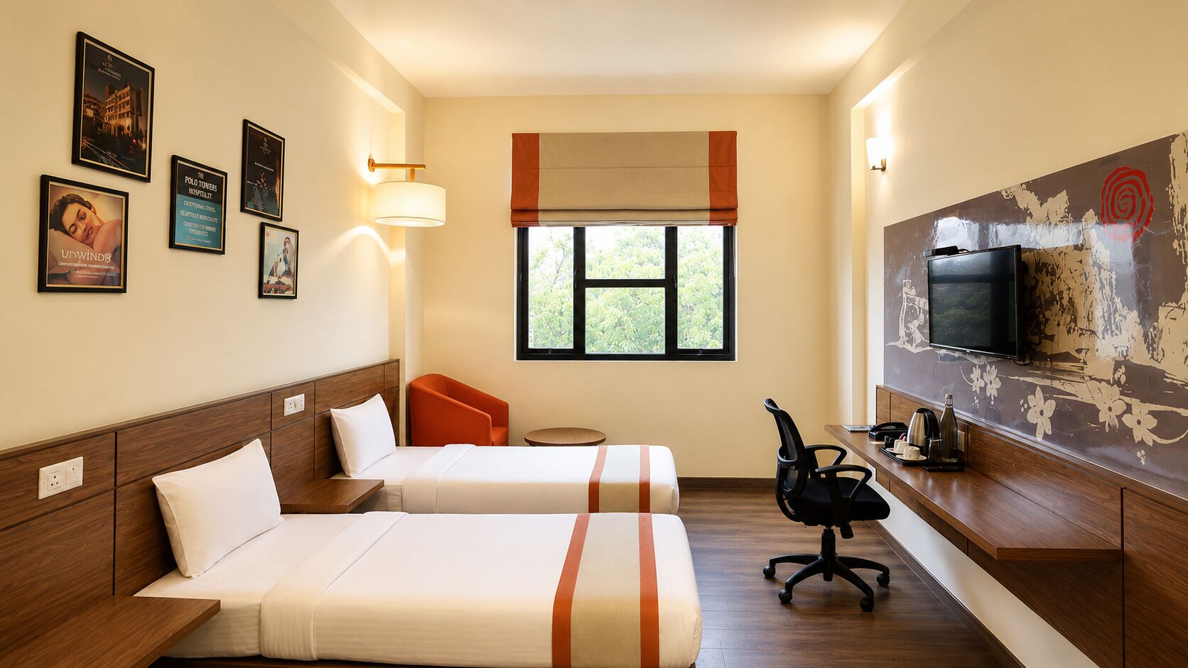 A hotel room with two beds, a desk, a chair, a television, and a window with a view.