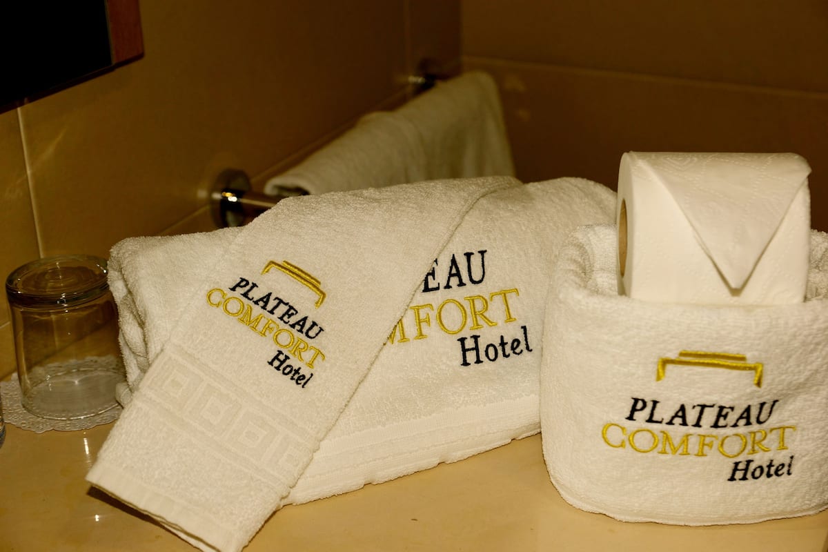 bathtub, free toiletries, hair dryer, towels