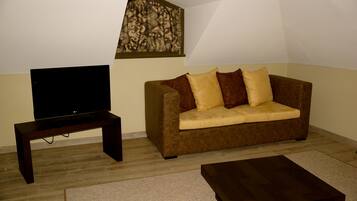 Business Twin kamer | Woonruimte | Flatscreentelevisie