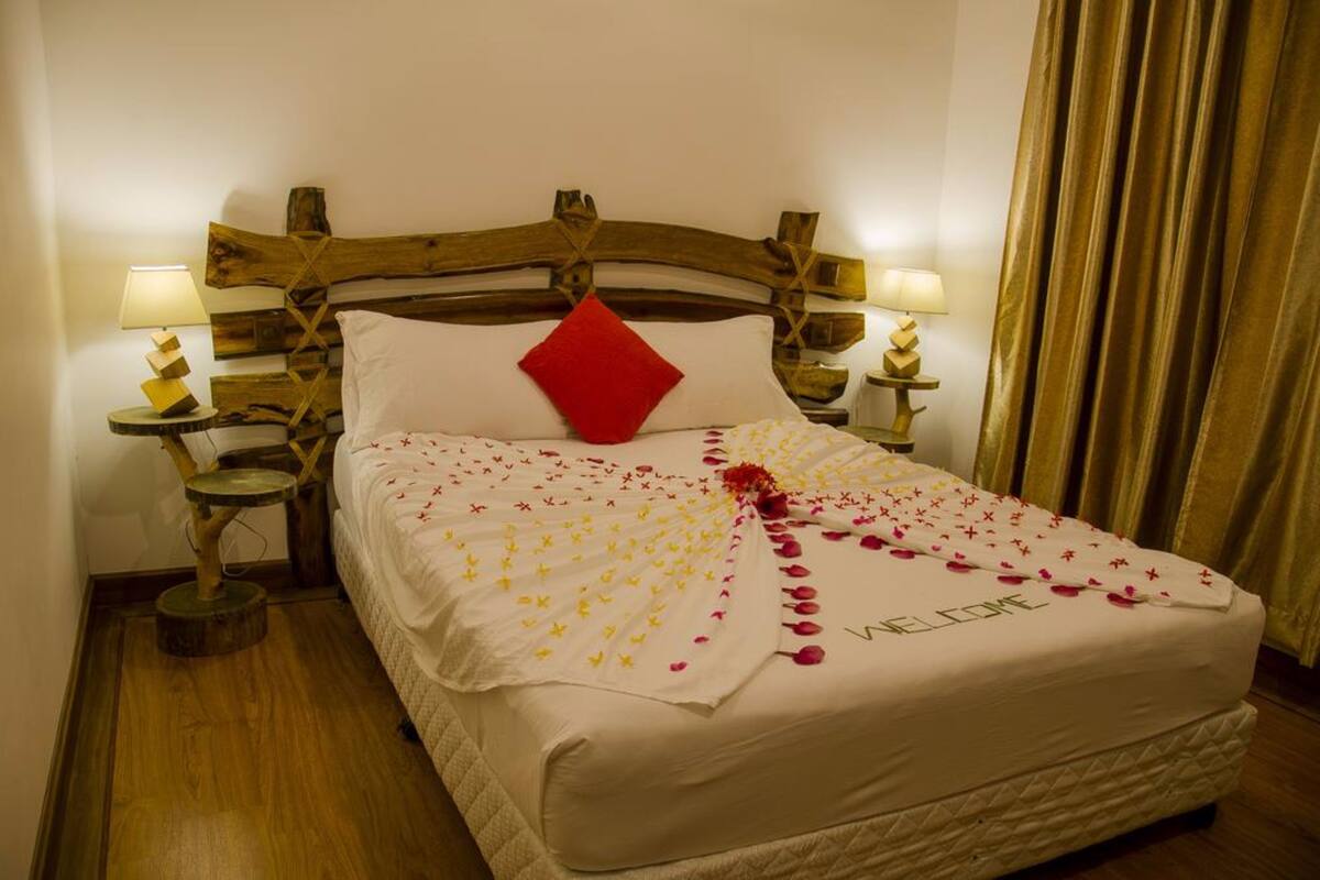 Chambre Double Deluxe, accessible aux personnes à mobilité réduite, en bord de plage | Minibar, coffres-forts dans les chambres, bureau