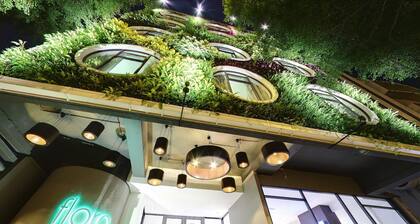 Flora by Crossroads Hotel