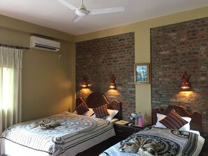 Habitación triple Deluxe, 1 habitación | Vistas desde la habitación