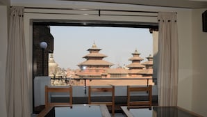 A room with a view of traditional pagoda-style buildings. - Lalit Heritage Home (Lalitpur)