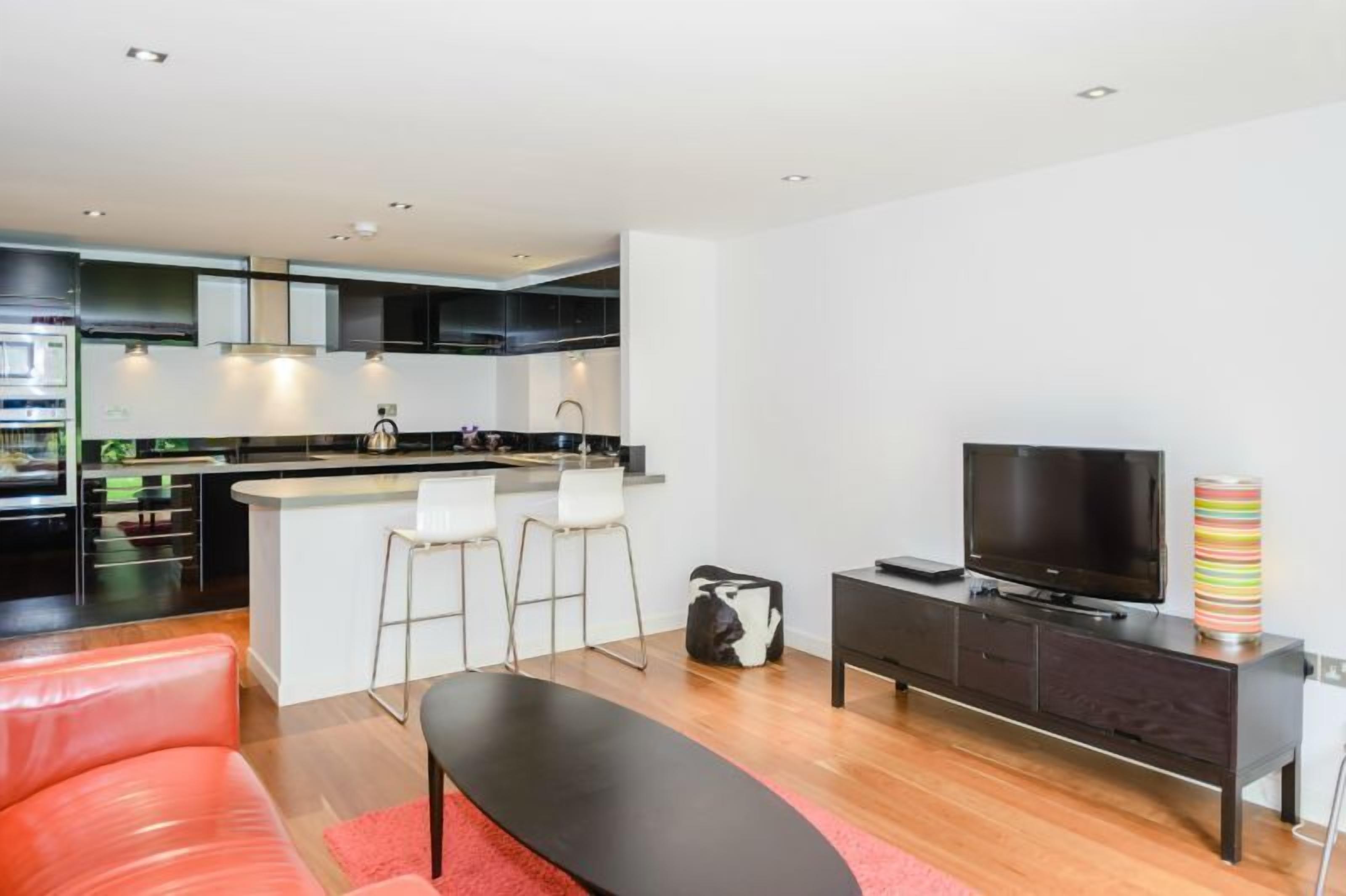 executive penthouse, 1 bedroom | living area | flat-screen tv