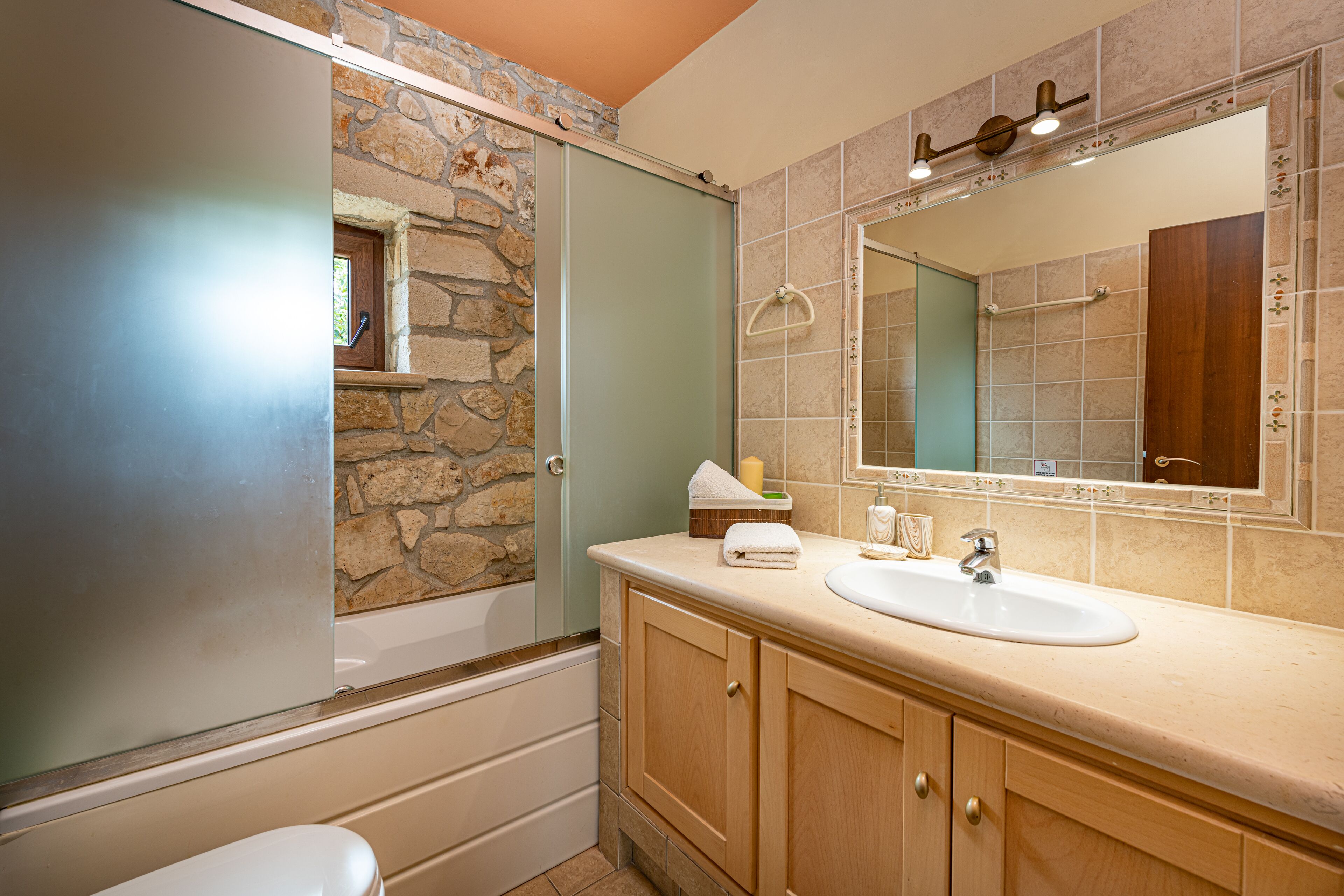 Separate bathtub and shower, hair dryer, bathrobes, slippers