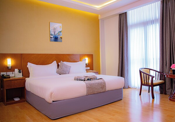 Ropa de cama de alta calidad y minibar 