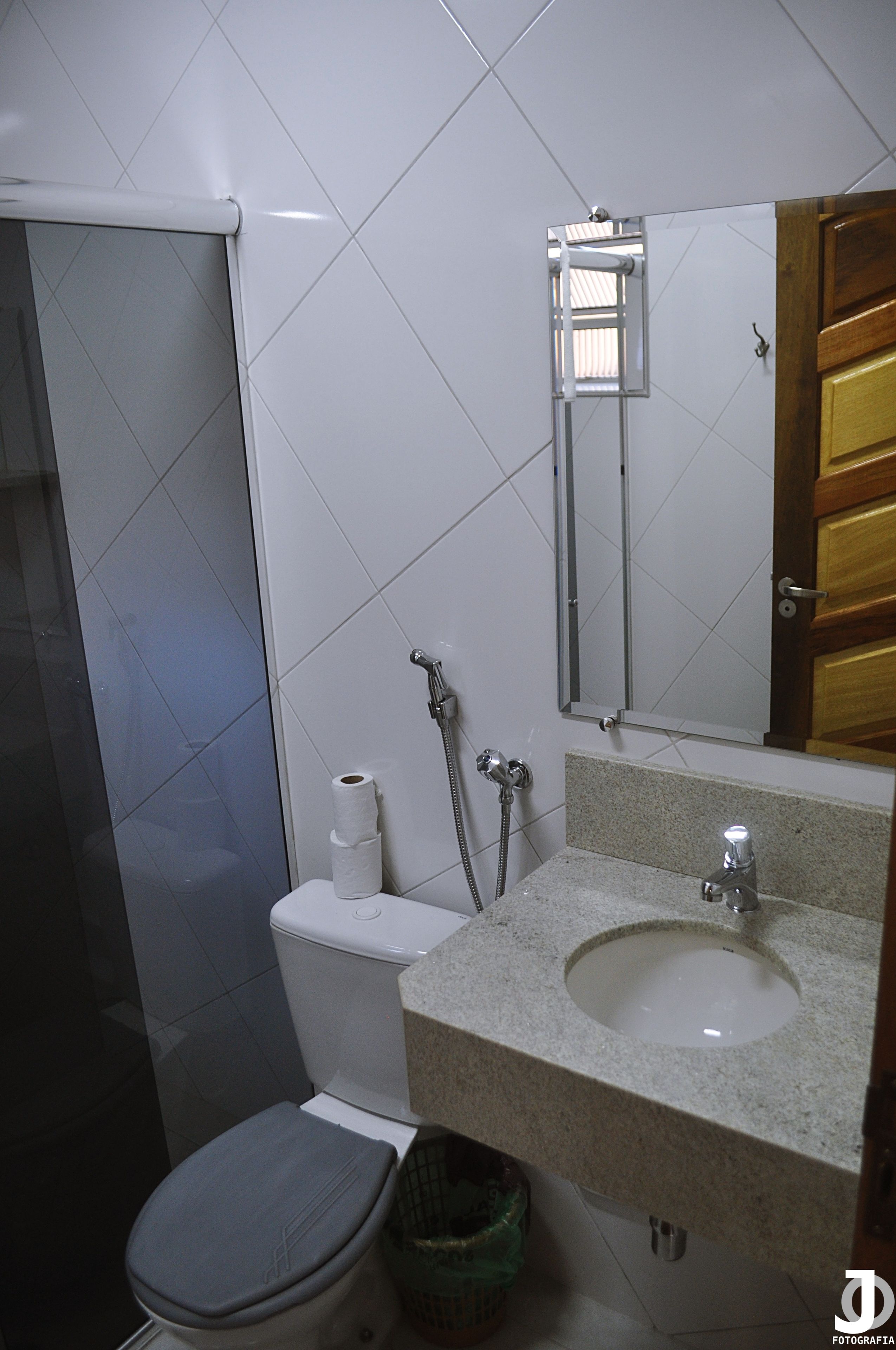 superior single room | bathroom | shower, rainfall showerhead, hair dryer, towels