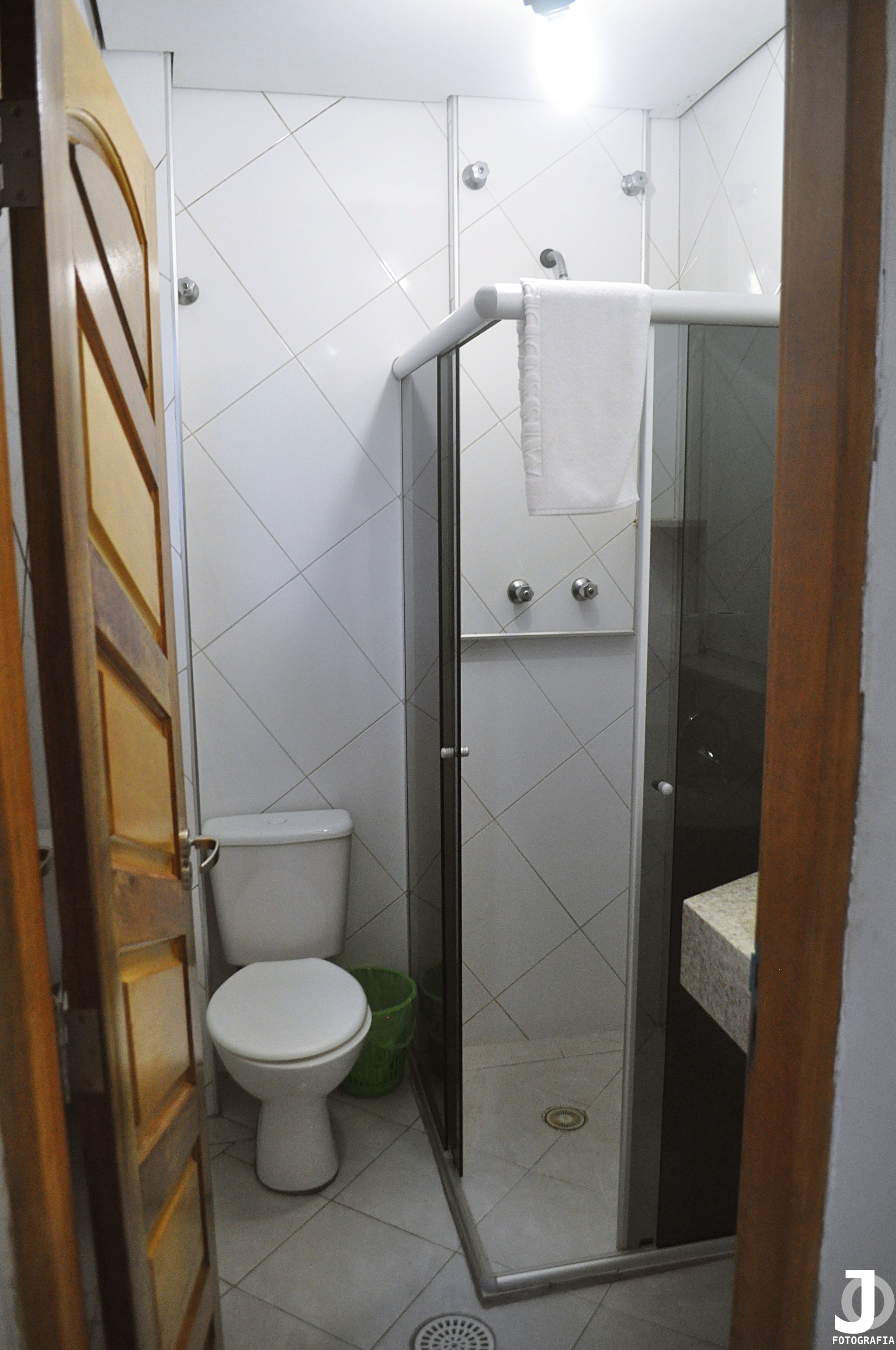 shower, rainfall showerhead, hair dryer, towels