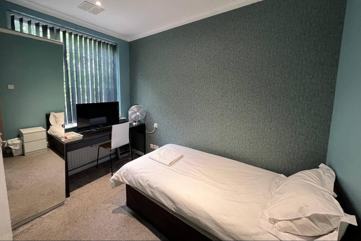 Desk, bed sheets
