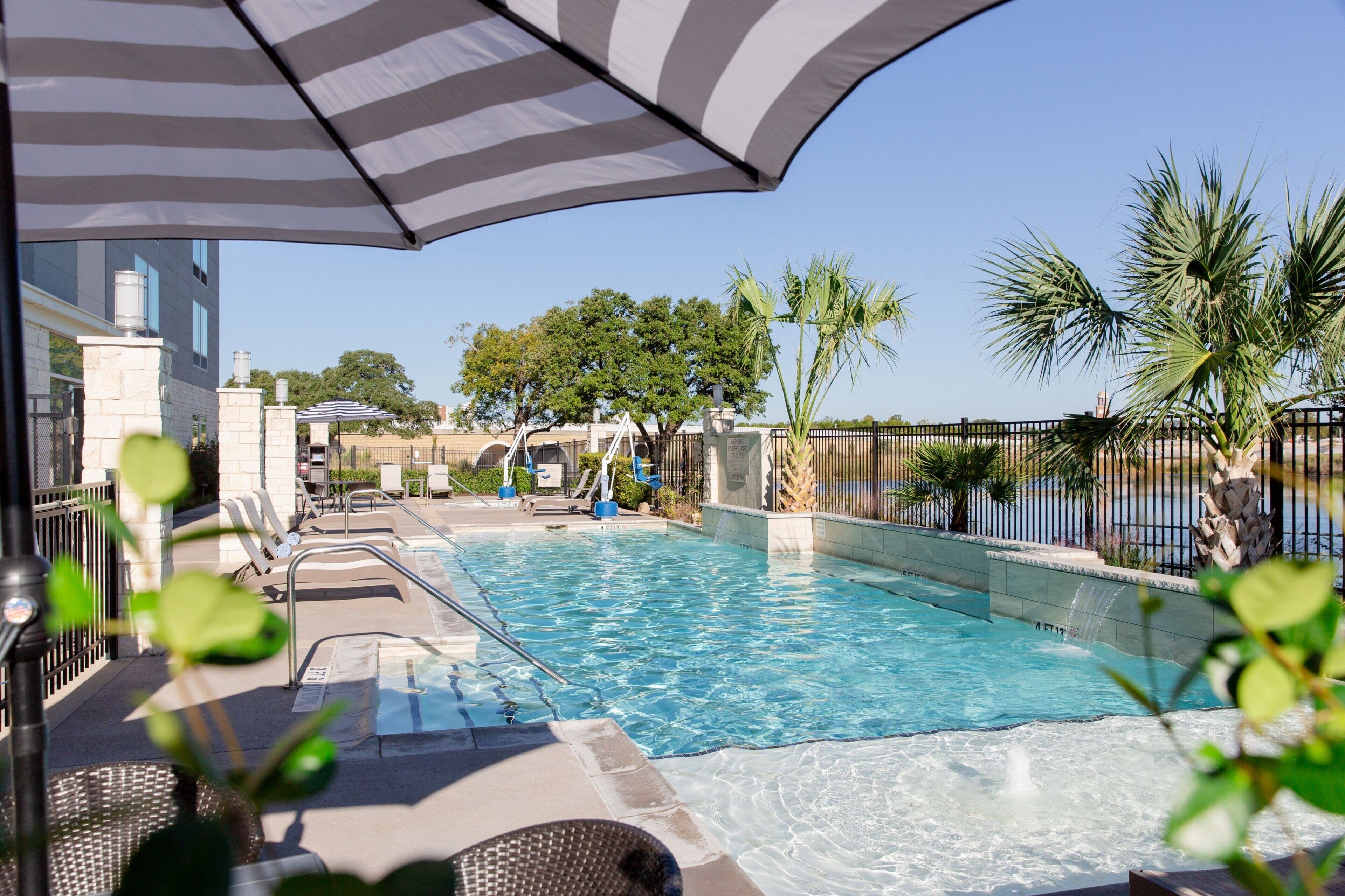Outdoor pool, pool umbrellas, sun loungers