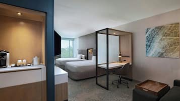 Premium bedding, desk, laptop workspace, blackout drapes