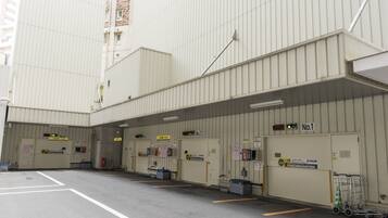 A parking garage with multiple levels and designated parking spaces.