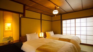 Suite (Garden, 2 Japanese futons) | 1 kamar tidur, setrika/meja setrika, Wi-Fi gratis, dan seprai linen