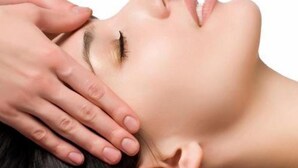 A person with their head resting on a hand, suggesting a relaxed or contemplative pose. - Dream Relax (Hulhumalé)