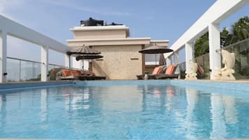 Outdoor pool, sun loungers