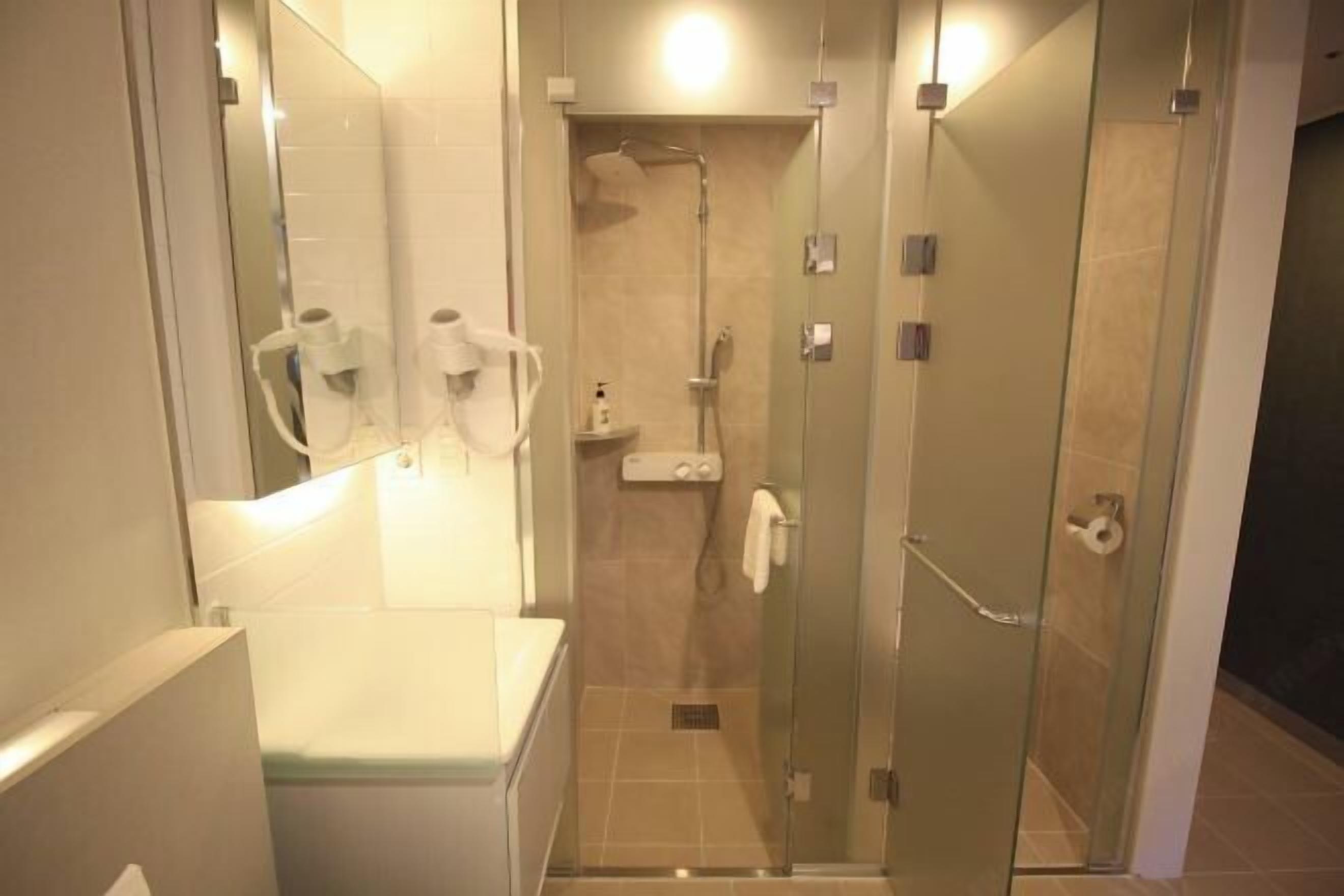 Hair dryer, slippers, towels