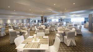 A large banquet hall with multiple tables and chairs, arranged in rows, suitable for events or conferences. - imm hotel Ladprao Bangkapi Bangkok (Bangkok)