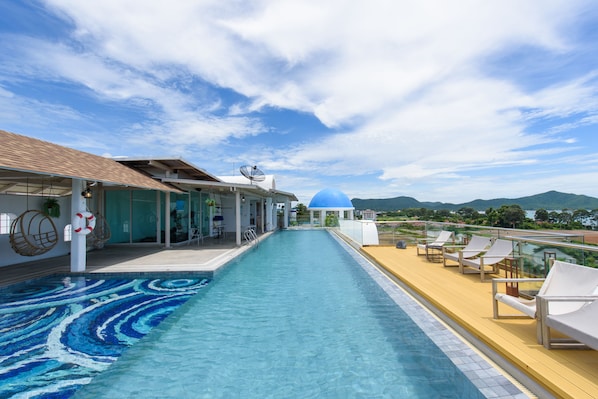 2 outdoor pools, open 7 AM to 8 PM, pool umbrellas, sun loungers