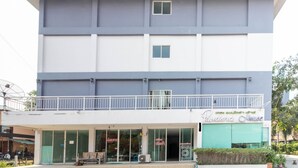 A two-story building with a balcony, a sign for 'Pandora House', and a visible entrance. - OYO 75389 Pandora house (Pattaya)