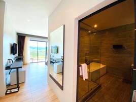 Deluxe Bathtub Mountain | Bathroom | Designer toiletries, hair dryer, bathrobes, slippers