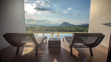 Deluxe Pool Access with Balcony | Minibar, desk, blackout curtains, free WiFi