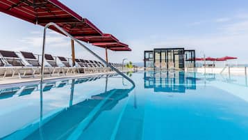 Indoor pool, seasonal outdoor pool, pool umbrellas, sun loungers