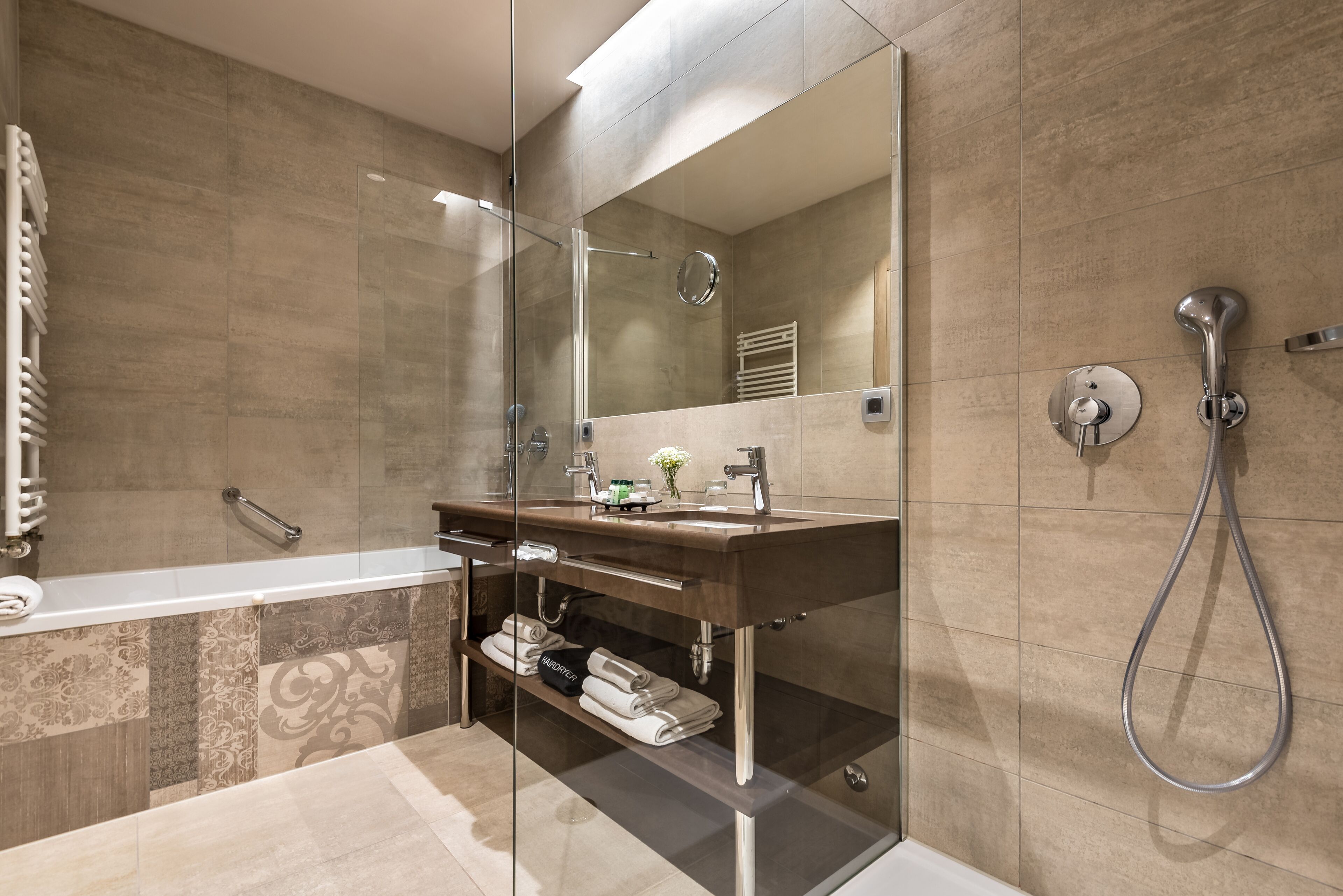 separate bathtub and shower, free toiletries, hair dryer, bathrobes