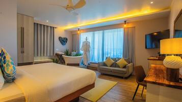 Suíte estúdio lua de mel, 1 cama King, banheira, vista para o mar | 1 quarto, frigobar, cofres nos quartos, escrivaninha