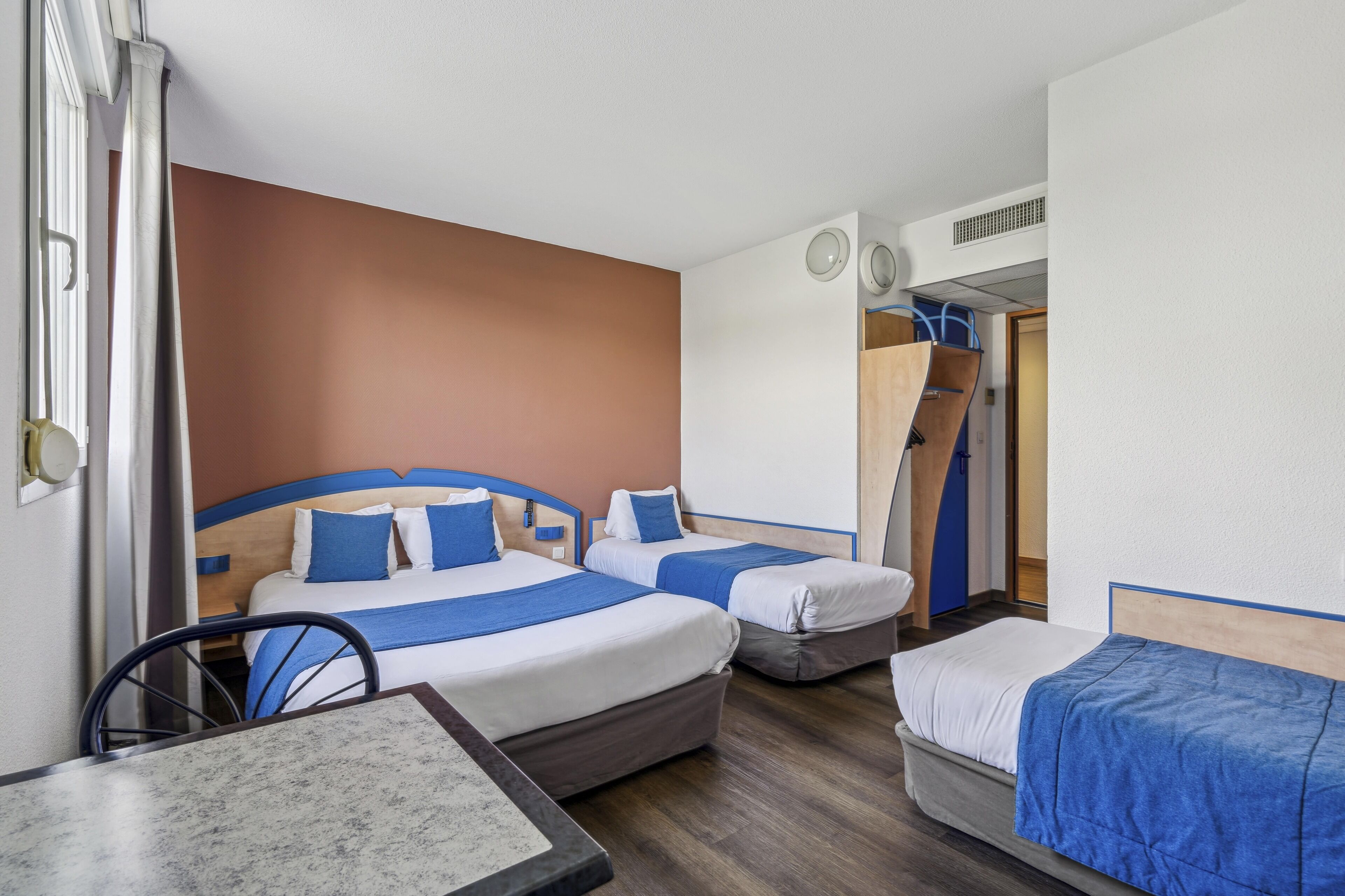 family room | desk, soundproofing, iron/ironing board, free cots/infant beds