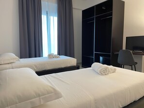 Ropa de cama de alta calidad y minibar 